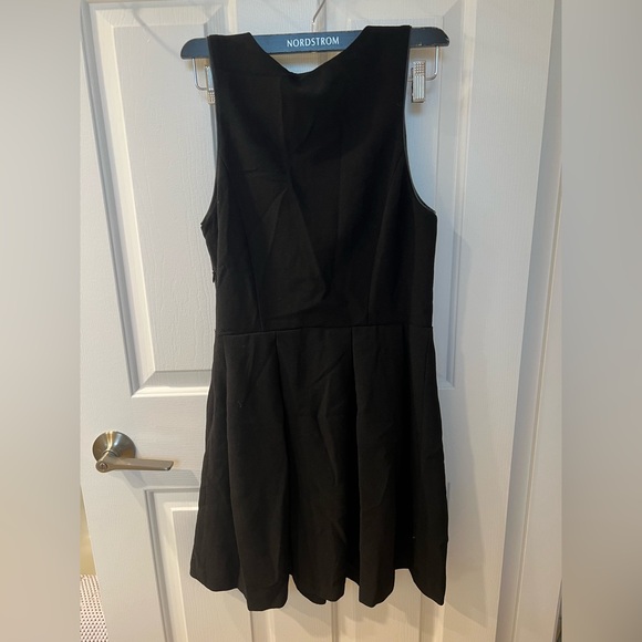 Black Sleeveless Mini Dress with Front Zipper - Picture 6 of 8